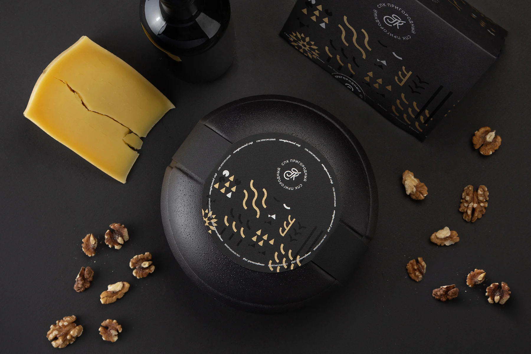 Premium packaging and cheese, overhead view