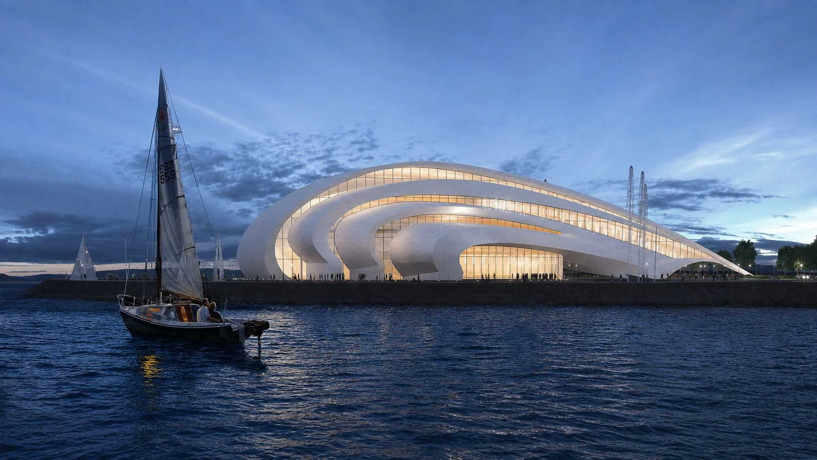 Evening view of the concert and festival hall from the water, with a sailboat in the foreground