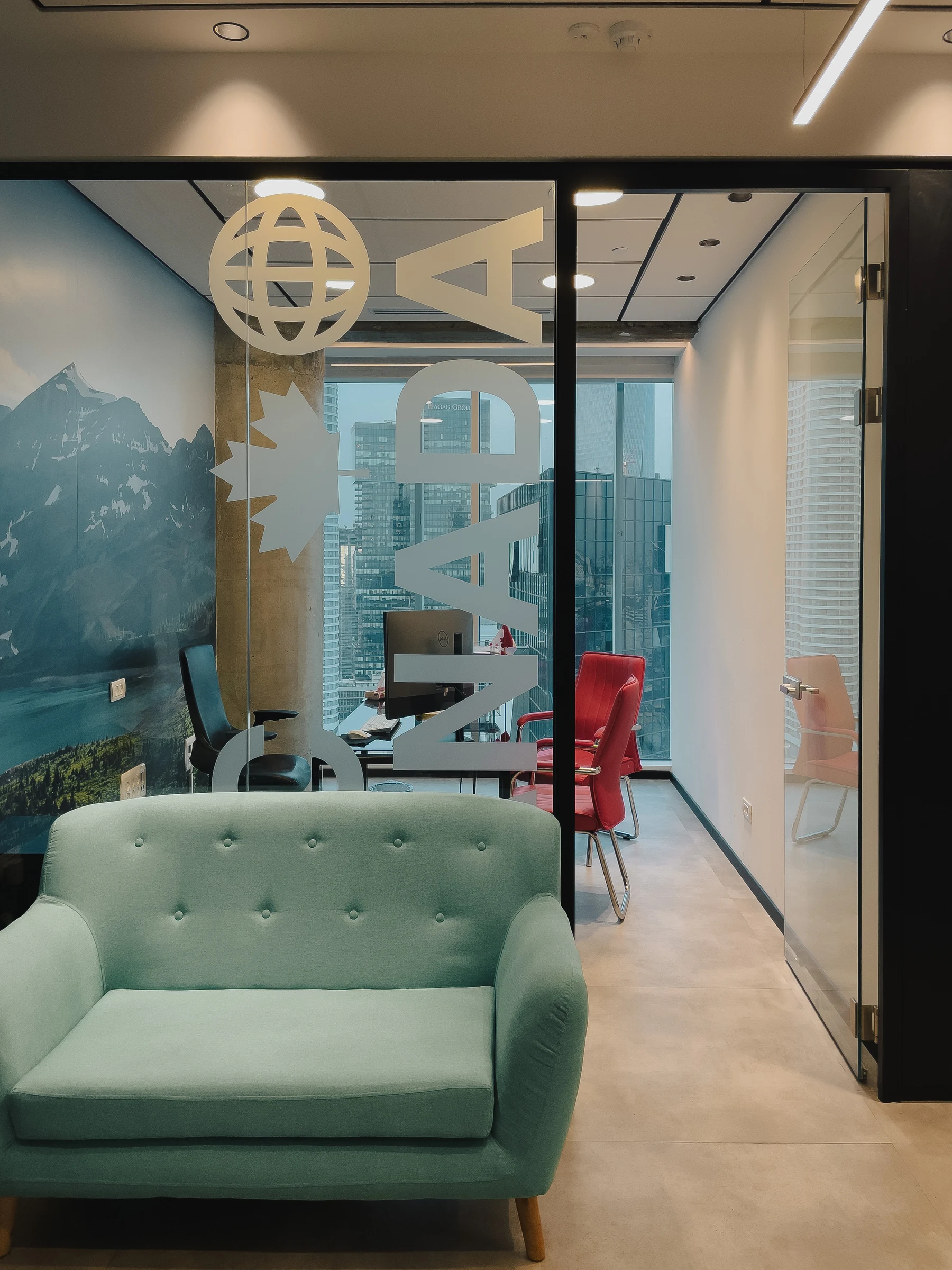Waiting area and glass wayfinding in the GIC CANADA office