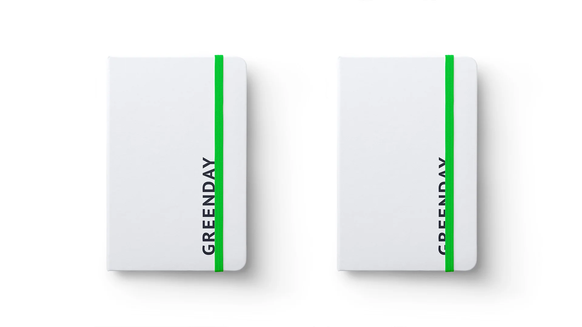White GreenDay notebooks with green elastic bands