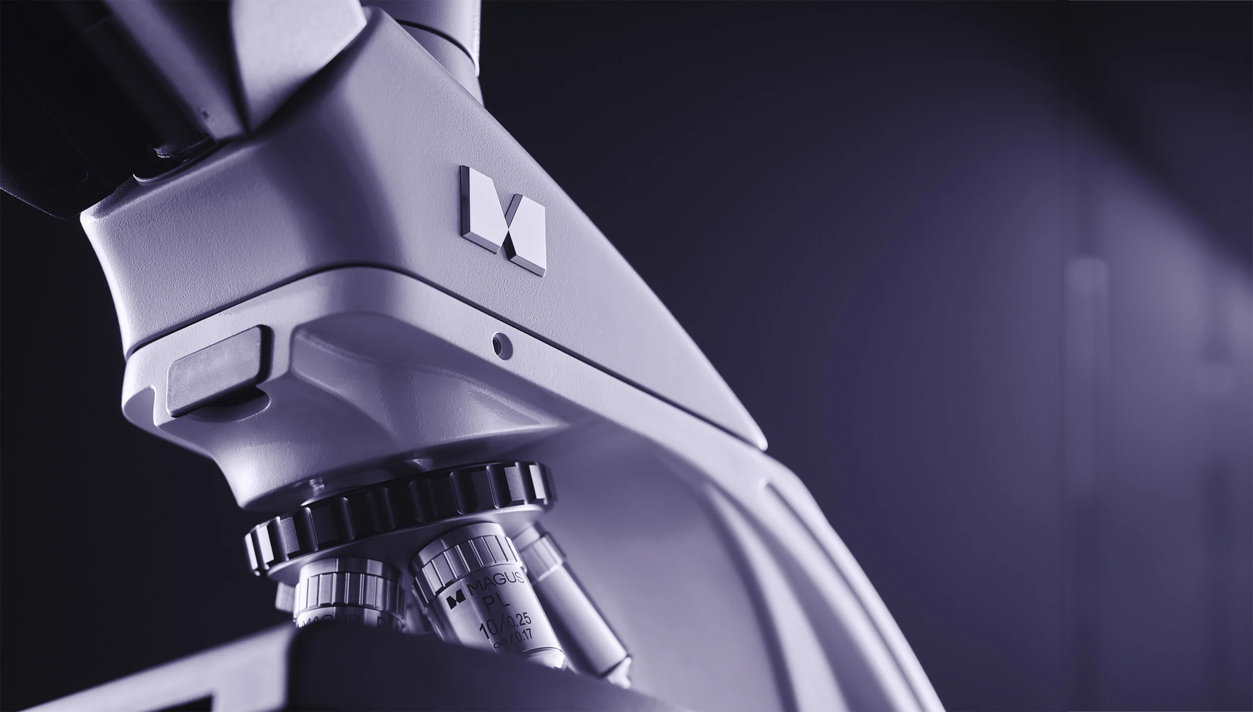 MAGUS professional microscope in artistic purple lighting
