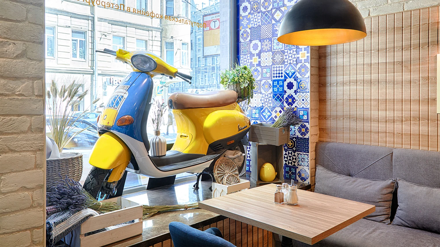 Pasteis & Coffee interior with azulejo tiles and brand colors