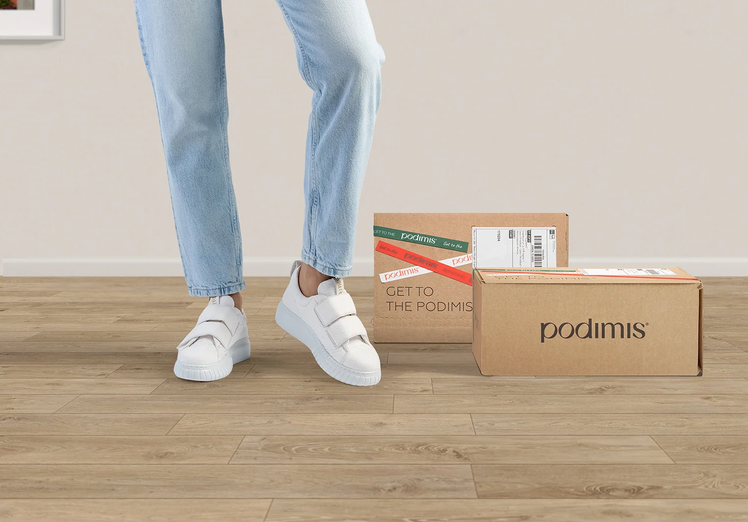 Shopper beside PODIMIS branded packaging