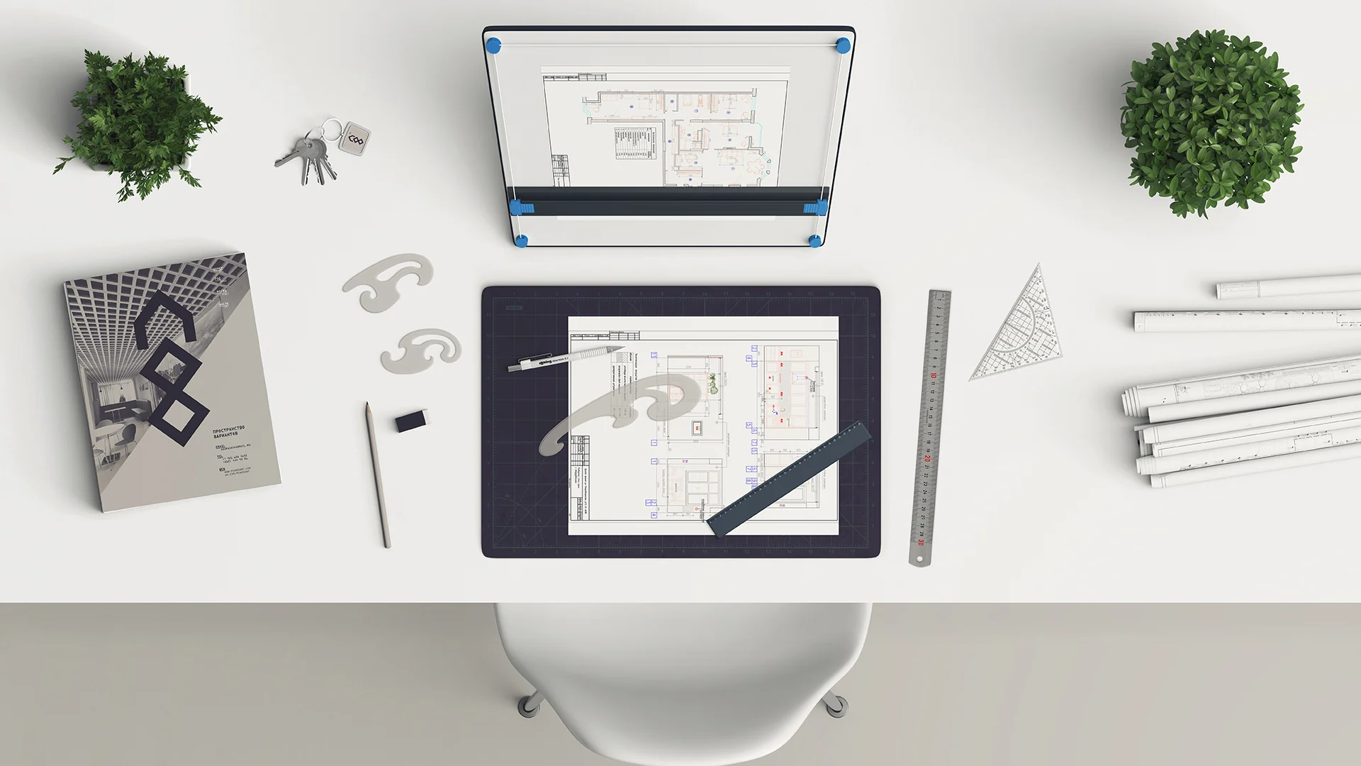 Interior designer's workspace with drawings and a Prostranstvo Variantov catalog