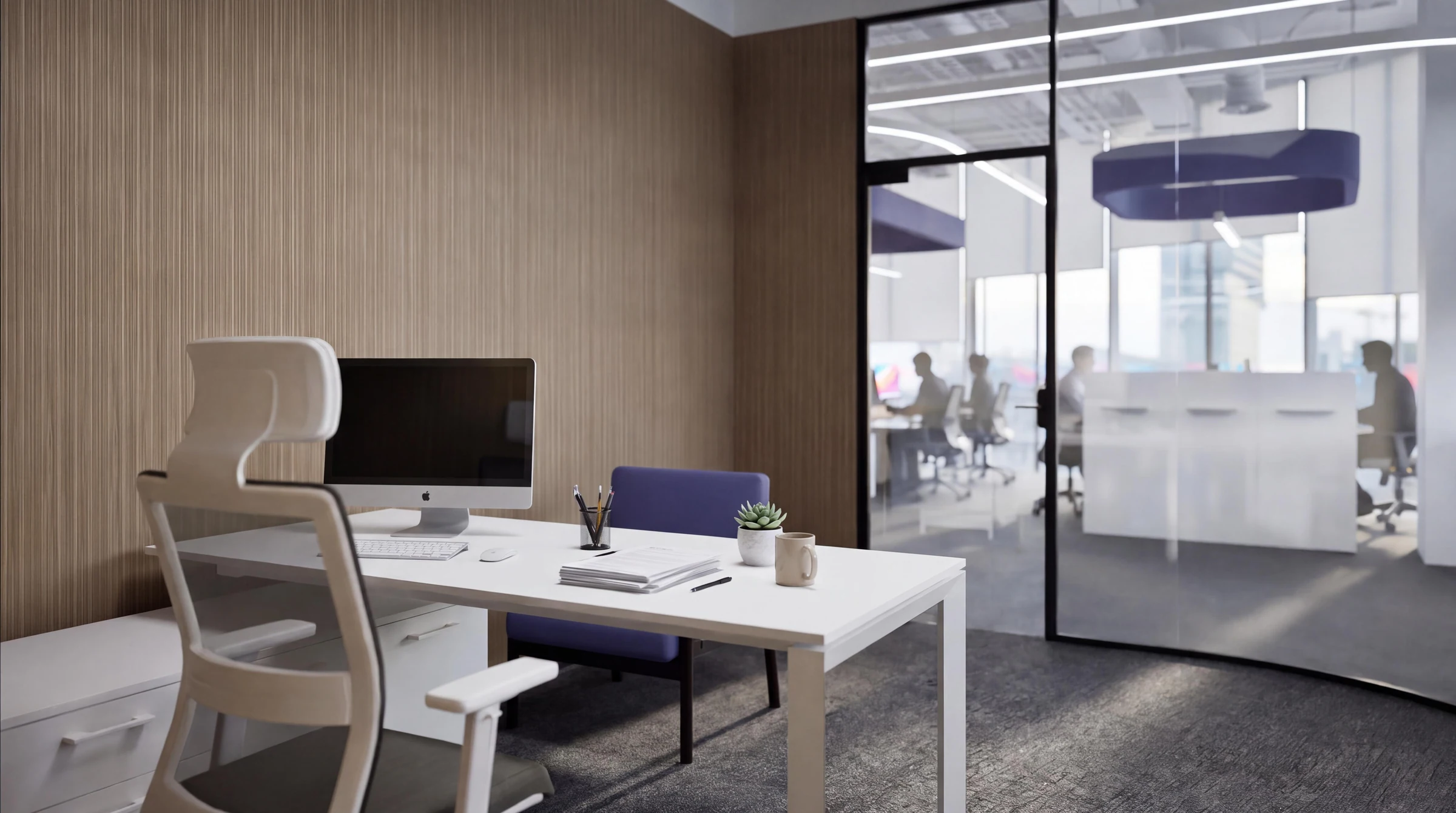 Private office overlooking the open workspace