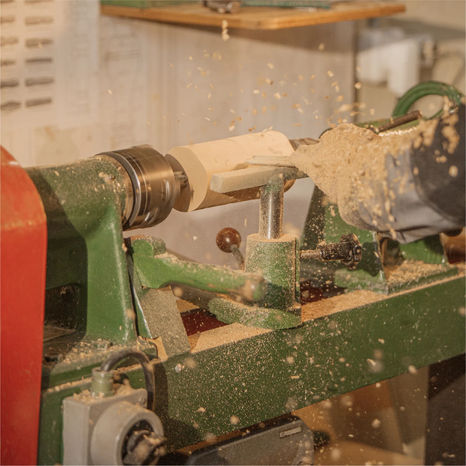 Turning a wood blank with flying shavings